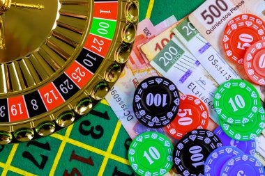 mujurbola app dashboard showing football betting slip, live casino tables, and QRIS deposit option